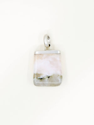 Pendant with a scenic design on a white background