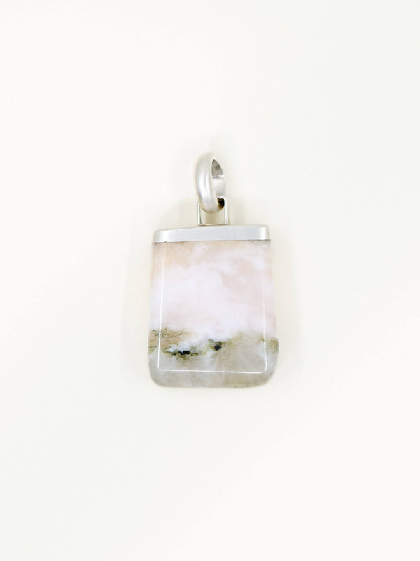 Pendant with a scenic design on a white background